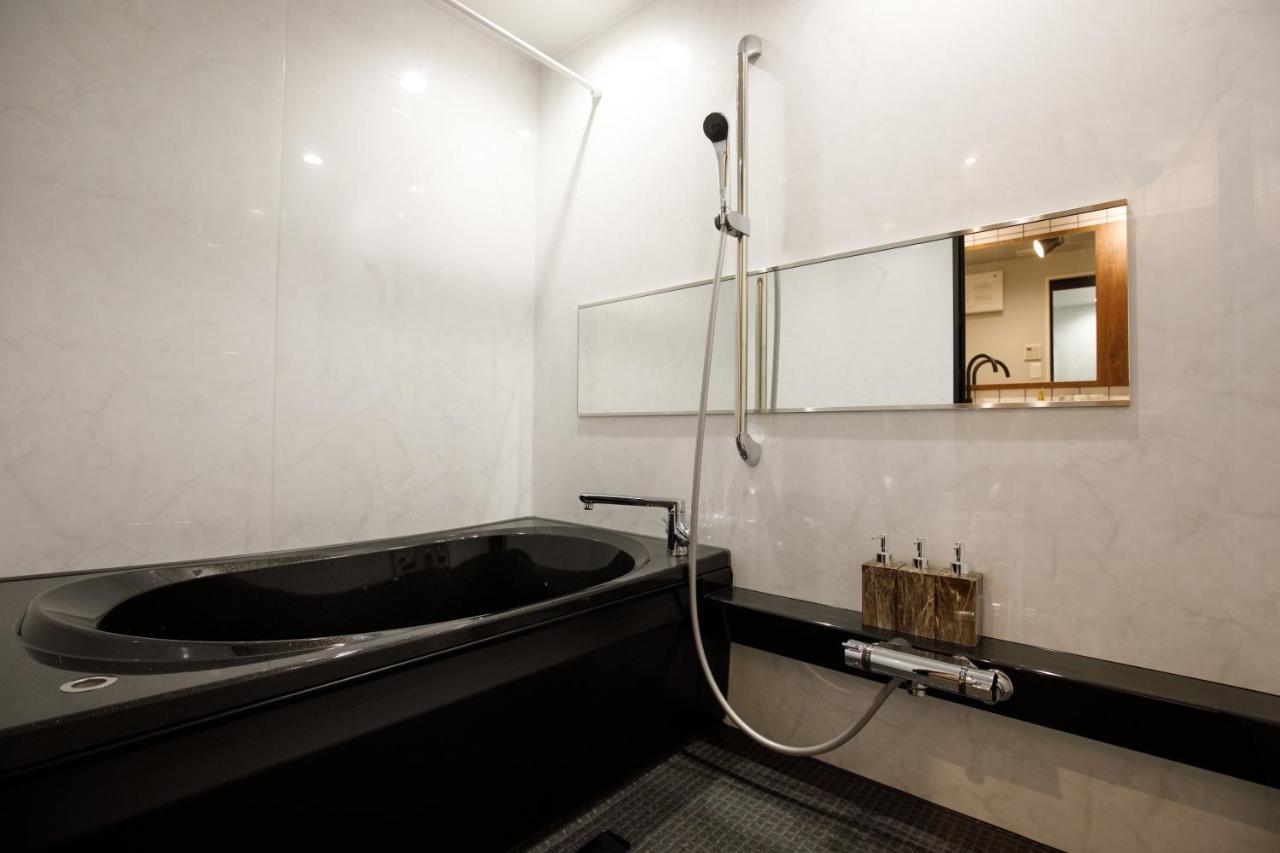 Hotel&Co Fukuoka  Bagian luar foto